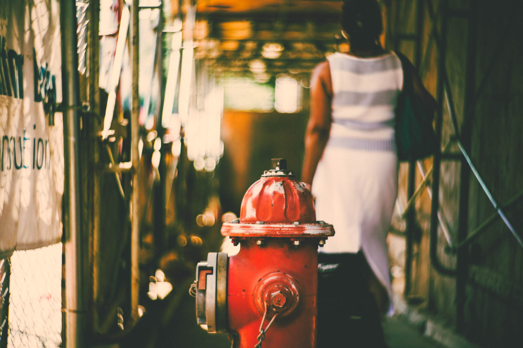 Hydrant and a woman.