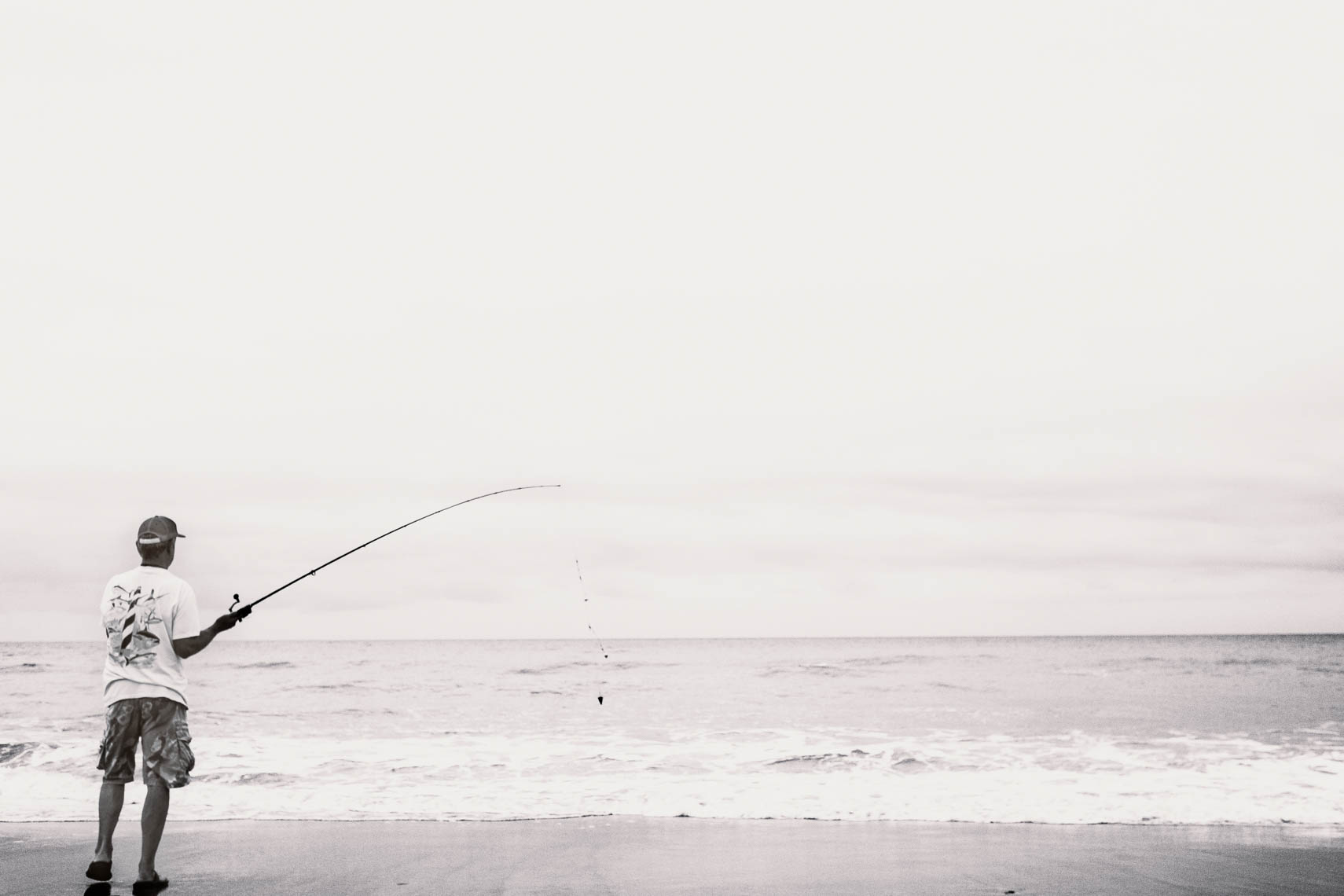 Fisherman at Pine Knoll Shores.